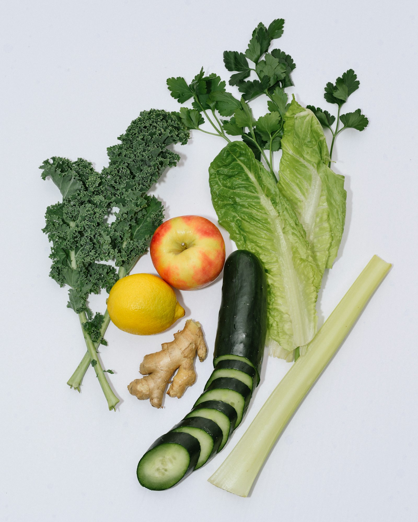 Fresh vegetables and herbs arranged on a table